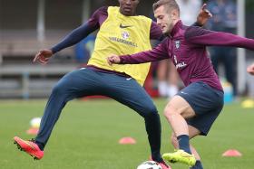 DAN&#039;S THE MAN: Danny Welbeck (in yellow) and Jack Wilshere (right) can combine well for Arsenal and England. 