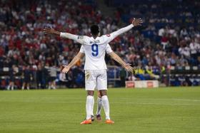 ON THE DOUBLE: Danny Welbeck celebrating with Rickie Lambert after scoring his second goal against Switzerland. 