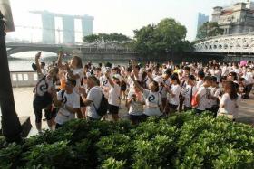 FUN: Walkers in high spirits, snapping pictures of themselves at the 2012 TNP Big Walk.