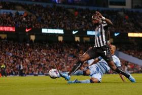 OUT YOU GO: Newcastle midfielder Moussa Sissoko&#039;s (No. 7) goal against Man City yesterday made it 2-0 and ended the Citizens&#039; defence of the League Cup.