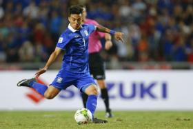 Charyl Chappuis of Thailand kicks to score from the penalty spot against Malaysia during their first leg soccer match final of the AFF Suzuki Cup 2014 in Bangkok December 17, 2014.