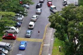 BOTTLENECK: The Electronic Parking System at the carpark at Lorong 8 Toa Payoh has caused long queues.