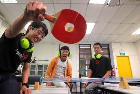 BANG: (From left) Singapore Polytechnic students Kendrick Hu, Douglas Wong and Daryl Heng with the Ballistic Accelerator Device.