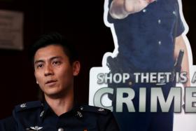 IN THE FLESH: (Above) Meet ASP Ryan Koh, the man from the standee, which has become a popular online meme.
