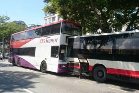 At least 20 people were in a bus collision at Changi Road this morning.