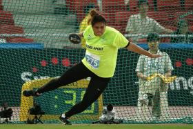 HISTORY MAKER: Thai discus thrower Subenrat Insaeng (above) rewrote her own record with a distance of 59.56m.