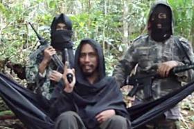 EXTREMIST: Screen grab of a YouTube video showing Indonesia&#039;s most wanted militant Santoso in an Al-Qaeda-style clip that is making the rounds online.