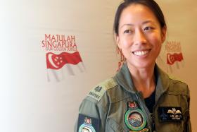 WOMAN FIGHTER PILOT: Major Lee Mei Yi.