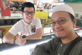 Facebook user Fais Al-Hajari's (right) post on his friendship with a cellphone seller at Low Yat Plaza has gone viral.