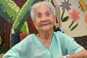 Madam Choon Keng Chan, 101, who fell in her living room and received help from the EMS