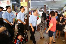 OUTREACH: Workers&#039; Party members at Chong Pang Market and Food Centre.
