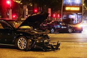 AFTERMATH: When The New Paper arrived at the scene at about 1am yesterday, only three of the vehicles were at the accident site - a black Audi, an SMRT taxi and an SBS bus.