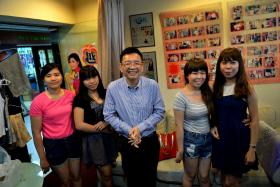 HOPEFUL: Mr Mark Lin, owner of Vietnam Brides International Matchmaker, with Vietnamese women hoping to find a husband here. 
