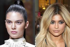 Model Kendall Jenner  (left ) and TV star sister Kylie ( right )