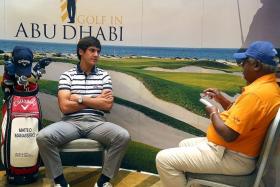 Matteo Manassero (left), in an interview with The New Paper’s Godfrey Robert (right) in Abu Dhabi last Monday.