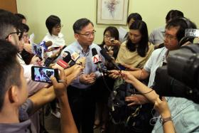 COMMENTS: Health Minister Gan Kim Yong speaking to reporters after the news conference.