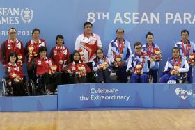SECOND-BEST: The Singapore team (in red) have to settle for silver after losing to winners Thailand.