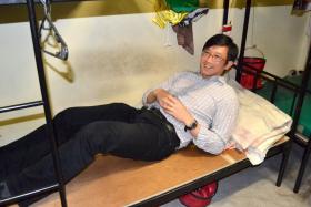 A picture of Mr Teo Ser Luck, Mister of State for Manpower lying down on a foreign worker&#039;s bed that was upload on MOM&#039;s Facebook page. 
The post attracted widespread criticism. 
