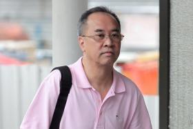 In a file photo, Koh Yong Chiah arrives at the State Courts on July 17, 2014.