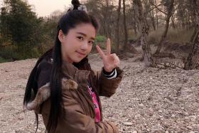 RISING STAR: Eleanor Lee with her traditional make-up and hairstyle preparing for filming TV period drama Tribes And Empires in mountainous Xiangshan, China.