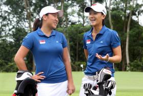 Singapore golfers Amelia Yong (left) and Koh Sock Hwee in a 2012 file photo.