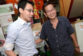 REUNION: Mr Tan Han Theng (right) met Mr Edwin Huang for the first time on Thursday since the incident.