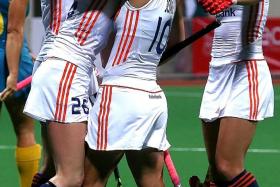 DUTCH DELIGHT: Holland (above) celebrate after scoring their second goal against Australia.