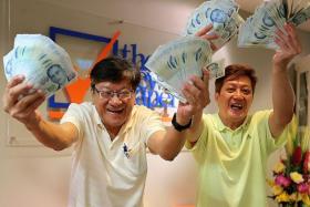 WINNERS: Mr Chiew Hock Hai (left) and Mr Lim Kim Peng each won $6,000 from the jackpot in The New Paper Bonus Challenge in June last year. $17,000 cash to be won in upcoming The New Paper contest