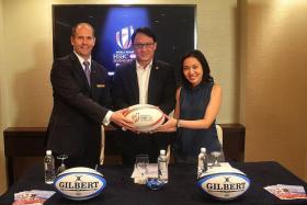 ALL SMILES: (From far left) Pan Pacific Singapore resident manager Steve Laine, Rugby Singapore board member Alvin Lee and Enterprise Sports Group director Koh Wa Cheng at the announcement of official partners yesterday.