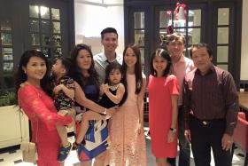 FUN IN THE END: Ms Caryn Lee (left, with her family) went ahead with the wedding dinner when she could not get her restaurant deposit back.