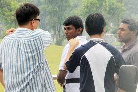 Sumanthiran Selvarajoo (centre) was jailed 16 years and sentenced to receive 12 strokes of the cane after he attacked and killed an elderly man with an umbrella at Ang Mo Kio park in 2011.