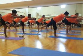 S-T-R-E-T-C-H: Hougang United players have incorporated yoga into their training regime.