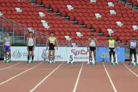EMPTY: Lane 5 of the men&#039;s 100m (35-39 age group) is empty after Singapore&#039;s UK Shyam withdrew at the last minute. The race was won by Sri Lanka&#039;s WBY Rohana (far right).
