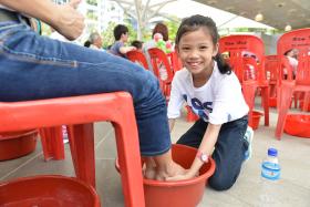 &quot;I felt good washing my mother’s feet and I didn’t feel shy or that it was anything unusual.&quot; - Jocelyn Tan