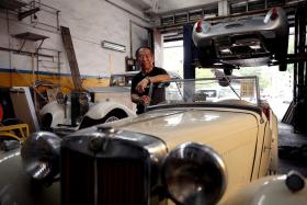 PASSIONATE: Mr Poon, who took over the business from his father in 1996, reckons that he has restored more than 2,000 vintage and classic cars.