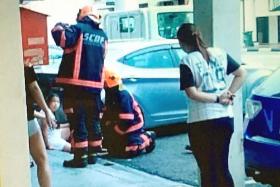 FREED: The 11-year-old girl was rescued by the Singapore Civil Defence Force.