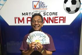 LUCKY SCORE: Mr Wari Ismail, a taxi driver, has won cash prizes in the TNP Match &amp; Score contest on four separate occasions, winning a total of $2,500.