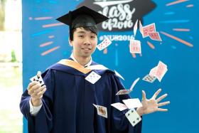 SUCCESS STORY: Mr Ervin Kwan, who does magic tricks as a hobby, graduated with a Bachelor of Computing in Information Systems with Honours.