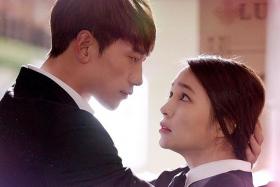 CHEMISTRY: (Above) Rain and actress Lee Min Jung in South Korean drama Come Back Alive.