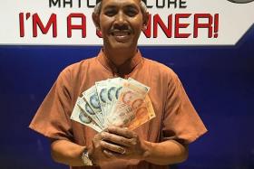 WINNERS: Jackpot prize winners Rahimi Assar (above), Lee Ah Choy and Kamarulzaman Osman each won $340 in cash yesterday. Mr Kamarulzaman won an extra $50 for being a TNP Superkaki.