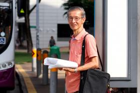 MOVING AROUND: Mr Michael Ng (photo) makes full use of his monthly senior citizen concession pass, which helps him to save on transport fees. 