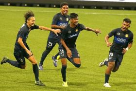 MATCH-WINNER:  Iqbal Hussain&#039;s (No. 14) late strike sends Hougang through to the Plate final.