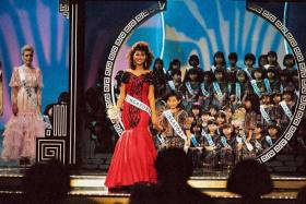 TUTOR: (Above) Ms Teo at the Miss Universe pageant when it was held in Singapore in 1987.