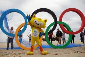 The 2016 Rio Olympics mascot Vinicius attends the inauguration ceremony of the Olympic Rings placed at the Copacabana Beach in Rio de Janeiro, Brazil, July 21, 2016. 