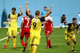 TOO GOOD: Fadli Kamis (below) seals the win for Balestier with a third goal yesterday.