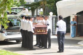 Mr S R Nathan&#039;s casket arriving at his home at Ceylon Road.