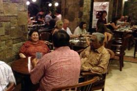 REGULAR: Mr S R Nathan and his wife Urmila Nandey were often spotted at Quentin’s.