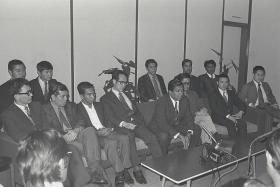 HOME SAFE: The return of the 13 men from Kuwait at the Singapore Airport in 1974. They had gone to Kuwait as guarantors of safe passage for hijackers who hijacked the Laju ferry. The team was headed by Mr S R Nathan.