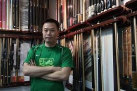 PASSION: Mr Eric Ong owns retail shop Monstercue Billiards in Bukit Timah Shopping Centre.