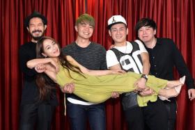 MUSICAL FAMILY: Cruise Control, comprising (from far left) guitarist Lai Jee Yon, drummer Joe Lee, vocalist Andy Zhang and pianist Zach Tan, and (being carried) one of the vocalists, Miss A. J. Ying. They appeared together for the first time during Happy Hour at Clarke Quay nightclub Shanghai Dolly on Monday.